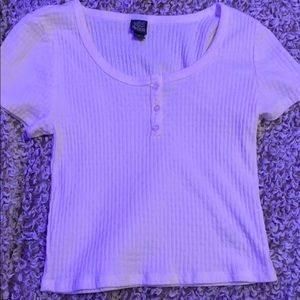 A juniors white crop shirt